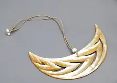 Steve Myhre, Large moon-shaped mother-of-pearl pendant, carved & polished mother-of-pearl pendant decorated with chevrons, cord necklace