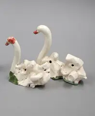 Two White Swans by Martin Poppelwell, glazed earthenware, two parts, sold Nov 2022