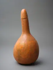 Geoffrey Fairburn, Decorated Gourd, incised and stained with a rhythmic motif to the neck and anthropomorphic figures to the body