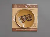 Enamel on steel dish by New Zealand Souvenir by Rangatira, with Māori rafter style pattern on the front, possibly designed by Theo Schoon, together with the original packaging, sold Nov 2022