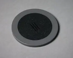 Coin of the New Realm #494 by John Edgar, argyllite and aluminium, sold Sep 2022