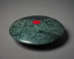 Lens 14 by John Edgar, serpentine (India) and cast glass, 2016, sold Sep 2022