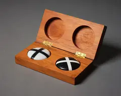 Saltire set from the Calculus series by John Edgar, marble and granite, diptych, in artist’s handmade wooden box, sold Sep 2022
