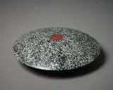 John Edgar, Lens, carved and inlaid tonalite lalitpur granite, Coromandel