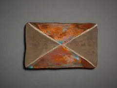 Untitled, Badge by John Edgar, copper and bronze, shaped and patinated, sold Sep 2022