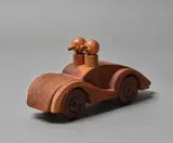Bill Hammond, Racecar, carved wood with two removeable figures