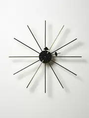 Star Clock by George Nelson, in chrome and brass tone metal; authorised re-edition by Vitra Design Museum, sold Jun 2022