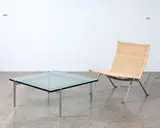 A classic PK 22 chair by Poul Kjærholm for Fritz Hansen, in satin brushed stainless steel and wicker, the chair epitomizes the designer’s search for ideal form and exemplifies t, sold Jun 2022