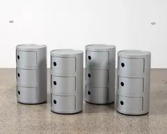 Two Componibili units by Anna Castelli for Kartell, originally designed in 1969, these examples contemporary and in silver; three units mounted together each with sliding d, sold Jun 2022