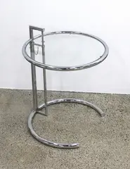 An Eileen Gray ‘Adjustable Table E 1027’ side table by Manufacturer unknown, sold Jun 2022
