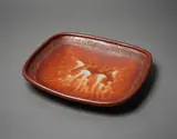 Large press-moulded platter by Len Castle, stoneware with shino glaze, decorated with impressed pattern to the cavetto, sold Jun 2022