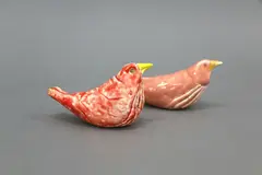 Rosemary McClay, Two bird forms, with red and pink glazes over a white slip