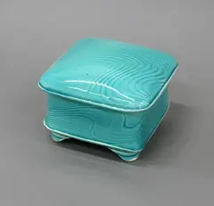 Merilyn Wiseman, Square lidded box, white earthenware with a bright blue-green glaze and carved gestural decoration