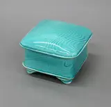 Merilyn Wiseman, Square lidded box, white earthenware with a bright blue-green glaze and carved gestural decoration