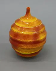 Small twig vase by John Parker, white earthenware with speckled orange glaze, c. 1990’s, sold Jun 2022