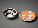 John Parker & Matthias Ostermann, Painted bowl, white earthenware decorated with a figure of a siren and a fish on a black background