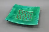 Merilyn Wiseman, Large square ceramic platter, in bright green glaze with abstract orange decoration to the centre and to the underside
