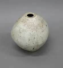 Jim Greig, Faceted vase, stoneware with pale grey and cream glazes with iron inclusions