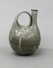 Stoneware pourer by Len Castle, in a speckled matt grey glaze, sold Jun 2022