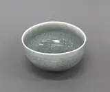 Celadon crackled glaze oval bowl by Len Castle, porcelain, sold Jun 2022
