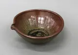 Lipped bowl by Len Castle, stoneware with kaki and ash glazes, carved to the interior with vertical lines in a sunray effect, sold Jun 2022