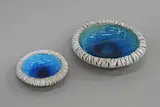Two Pacific series bowls by Len Castle, both with bright alkaline blue glazed interior and textured exterior, sold Jun 2022