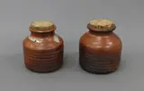 Two matching shino glazed jars by Len Castle, stoneware, with original cork lids, sold Jun 2022