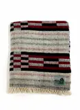 Roslyn Dunedin textiles, Early Manatunga travel rug, with a tukutuku panel pattern in white, magenta, and black