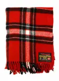 ‘Thibenzole Celebration Pack’ travel rug by Onehunga Woollen Mills for Merck Sharp & Dohme Nz, with a red, black, and white plaid pattern, sold Jun 2022