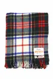 ‘Napier Pania’ travel rug by Dunedin Mosgiel Woollens Ltd, with a ‘Dress Stewart’ tartan pattern in dark green, white, black, red, and blue, sold Jun 2022