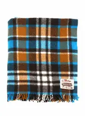 Dunedin Roslyn, Moereka Rug, with a plaid pattern in bright blue, dark and light brown, and white