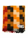 Onehunga Woollen Mills, Te Ariki travel rug, with a poutama (stairway to heaven) tukutuku panel design in orange, red, black and white