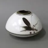 Peter Collis, Shaped squat vase, glazed and painted ceramic decorated with stylised leaf and berry motif on white ground