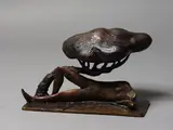 Paul Dibble, Reclining Figure and Manuka, cast bronze, edition of 5