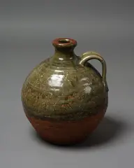 Large Flagon by Len Castle, stoneware with poured green ash glaze to the shoulders, sold Nov 2021