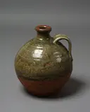 Large Flagon by Len Castle, stoneware with poured green ash glaze to the shoulders, sold Nov 2021