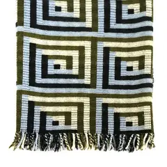 Manatunga, Travel rug, decorated with a tukutuku panel pattern in green, white, blue and black