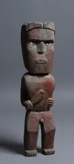 Carver Unknown, Tekoteko - Standing figure holding Patu or Mere, carved wood, c.1880-1920