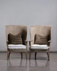 Usa Formations, A pair of Barrel Chairs, in limed wood with covered seat cushion and kidney pillow