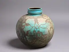 Graeme Storm, Large stoneware vase, with carved decoration and blue and brown glaze