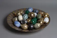 Rot Hamilton, A large and impressive ceramic bowl, with gilt, silver and impressed decoration, together with a collection of multi-coloured ceramic eggs and balls by Warren Randall