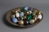 Rot Hamilton, A large and impressive ceramic bowl, with gilt, silver and impressed decoration, together with a collection of multi-coloured ceramic eggs and balls by Warren Randall