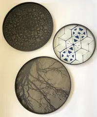 Notre Monde, Three large wooden trays, manufacturer stamp to the bases