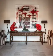 Lisa Roet, Red Monkey, cast bronze, red patina and gold plate, edition of 6