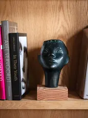 Jim Allen, Portrait of the Artist’s Son, Tony, cast bronze on timber base, 1950