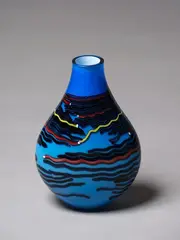Ann Robinson, Flask, hot-worked flask, cased blue over opaque white with random canes of red, black and yellow