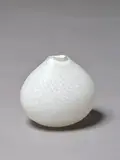 Lyndsay Patterson, Vase, White blown glass with cut diamond shaped decoration