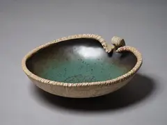 Len Castle, Avian Bowl, the interior with crackled dark green and dark grey glazes, umber pigment rubbed exterior