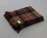 Early Onehunga Woollen Mills, Travel rug, in an orange, green, blue and black tartan design