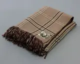 Early Kaiapoi Woollen MFG.Co, Travel rug, in a dark red, brown, khaki and white tartan pattern with green and orange details